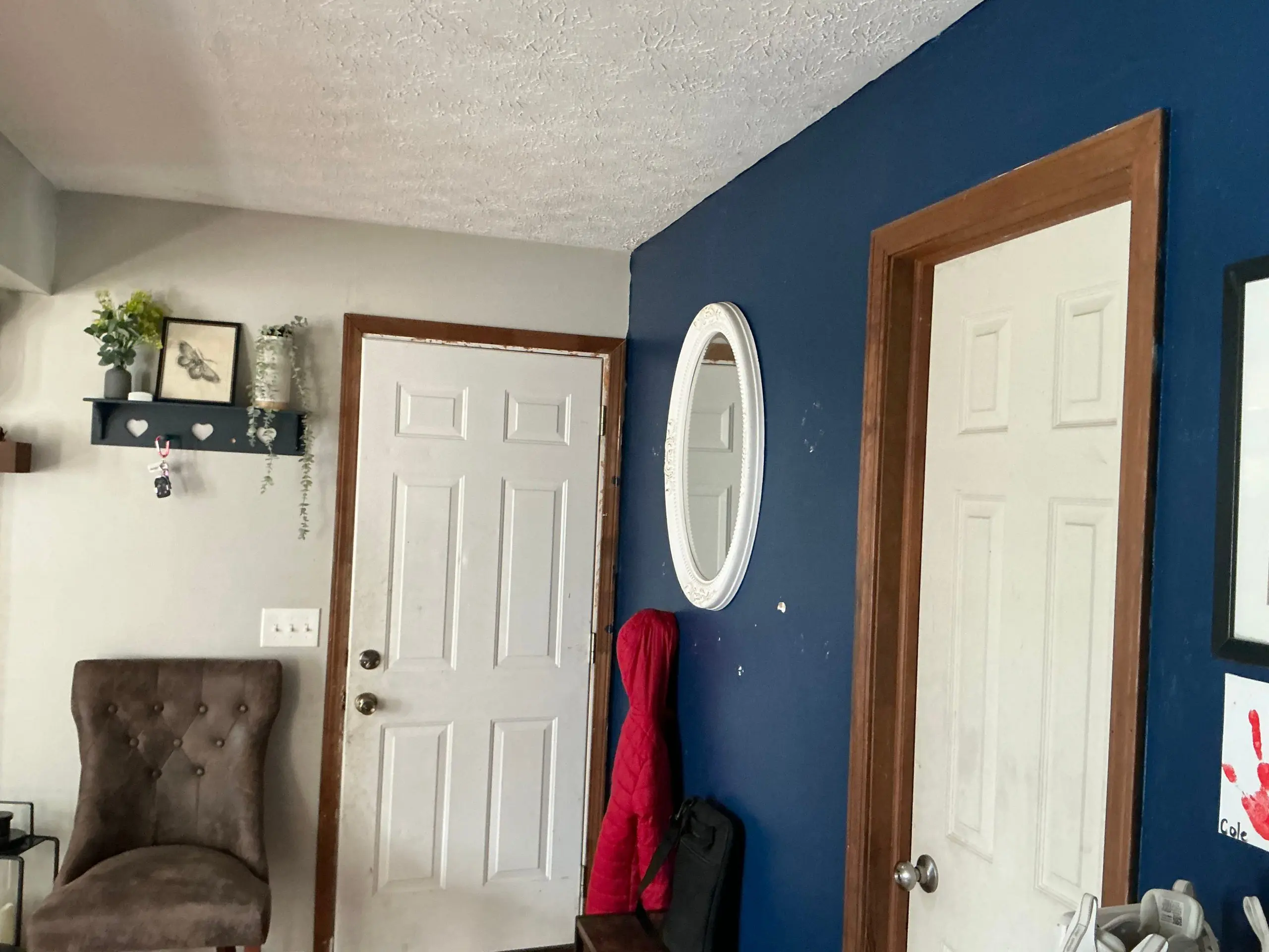 hallway walls painted navy blue in Buffalo home