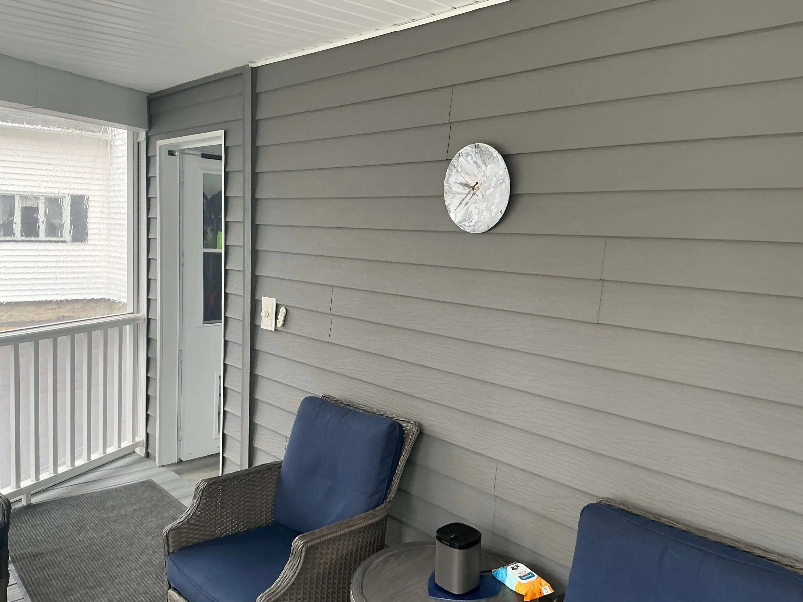 freshly painted siding on Rochester suburban home