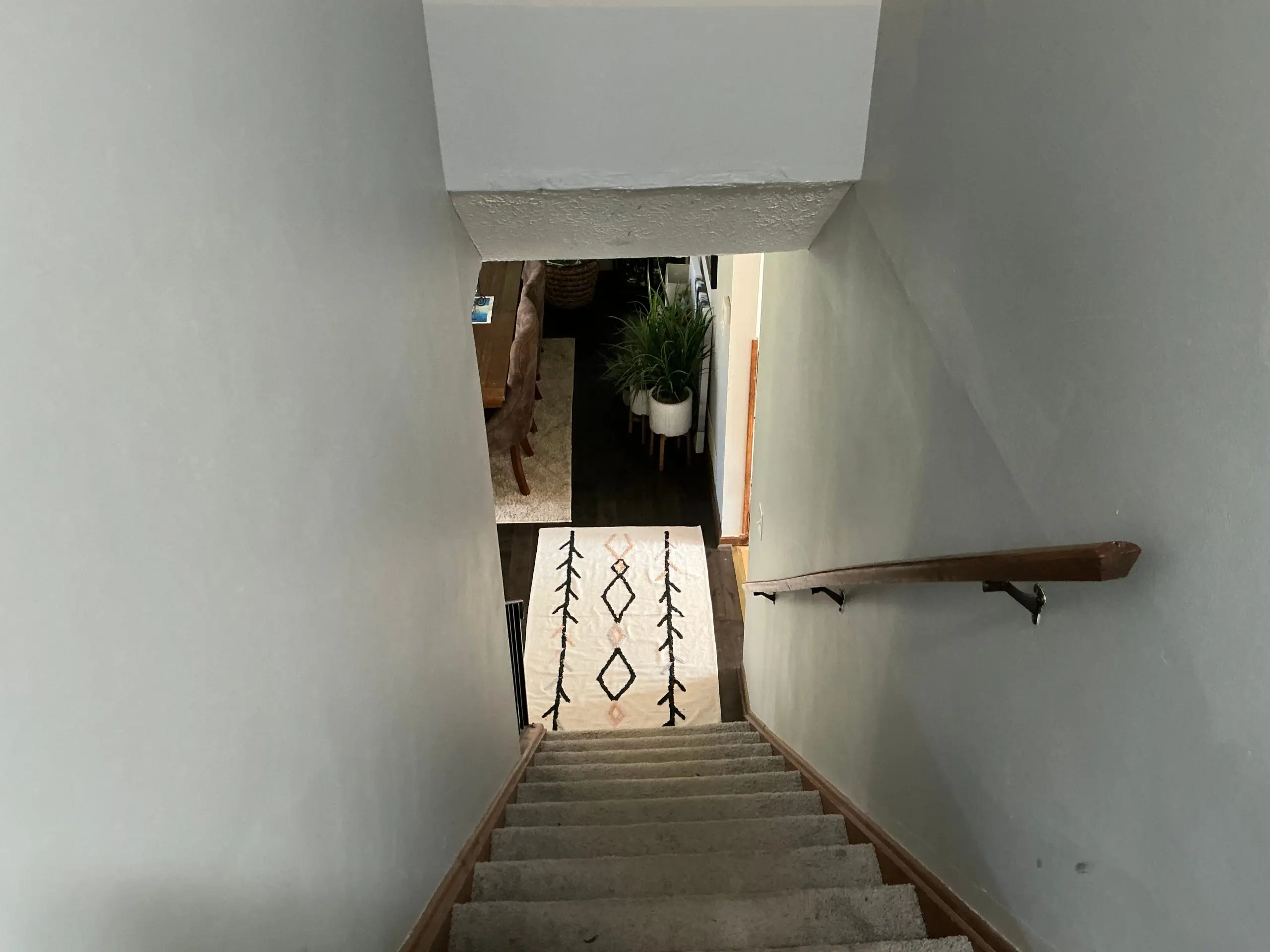 stairwell walls painted light gray in Rochester home