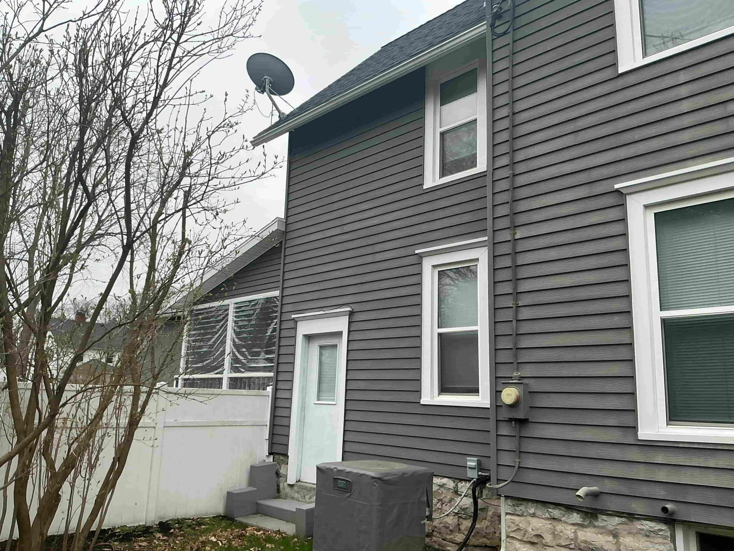 freshly painted siding on Buffalo suburban home