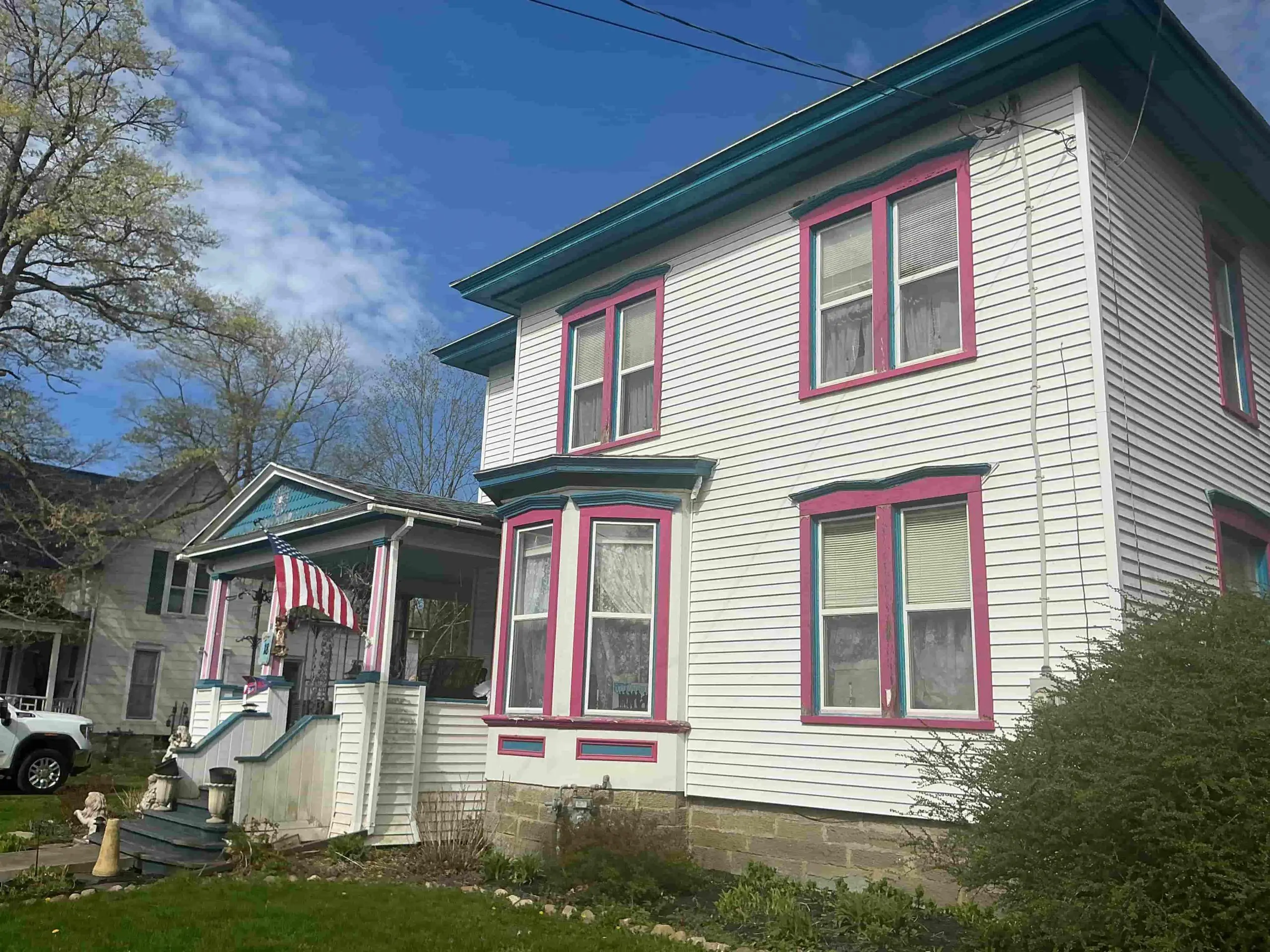freshly painted siding on Rochester suburban home