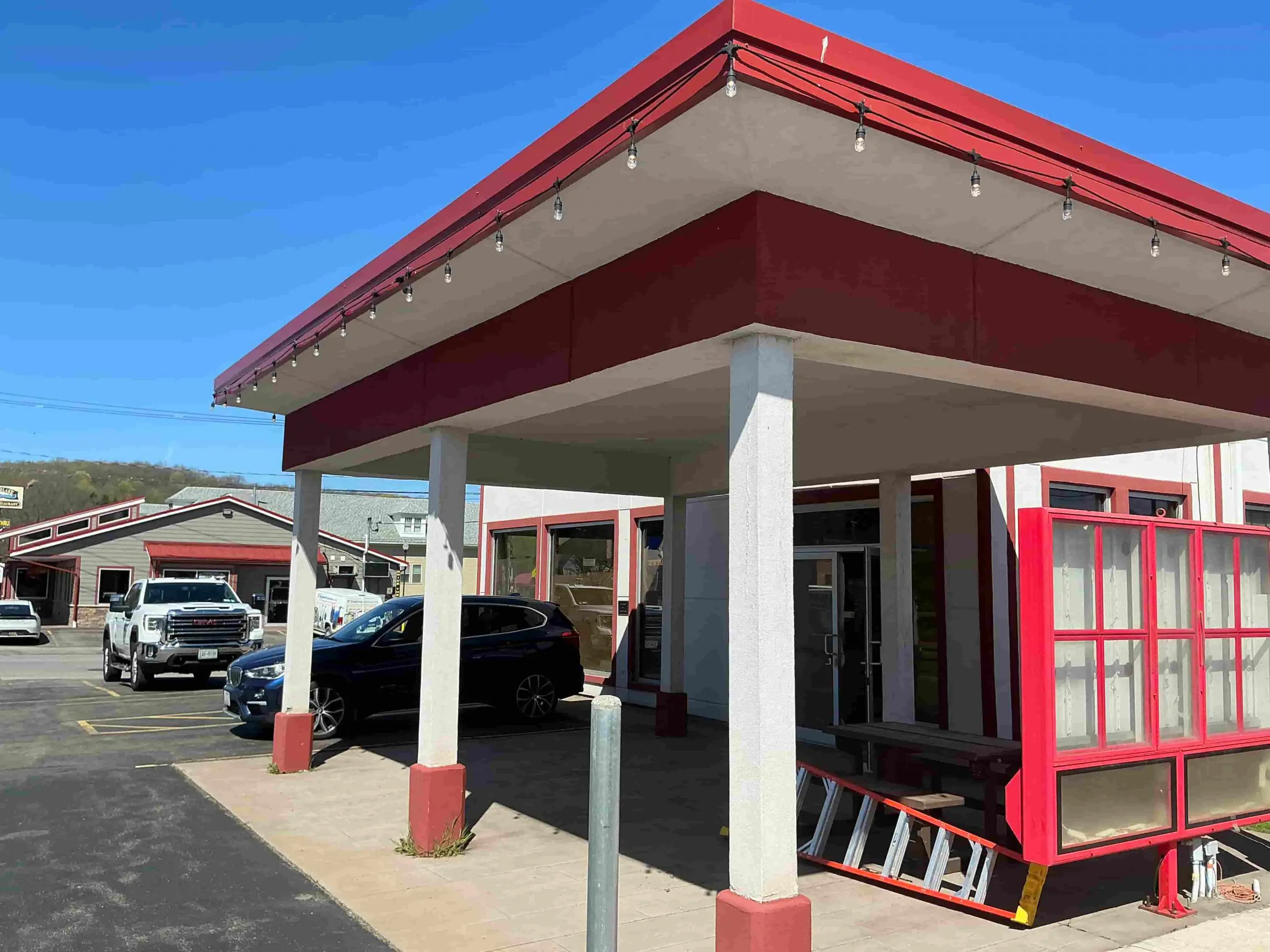 Buffalo commercial space painted red and white accent exterior