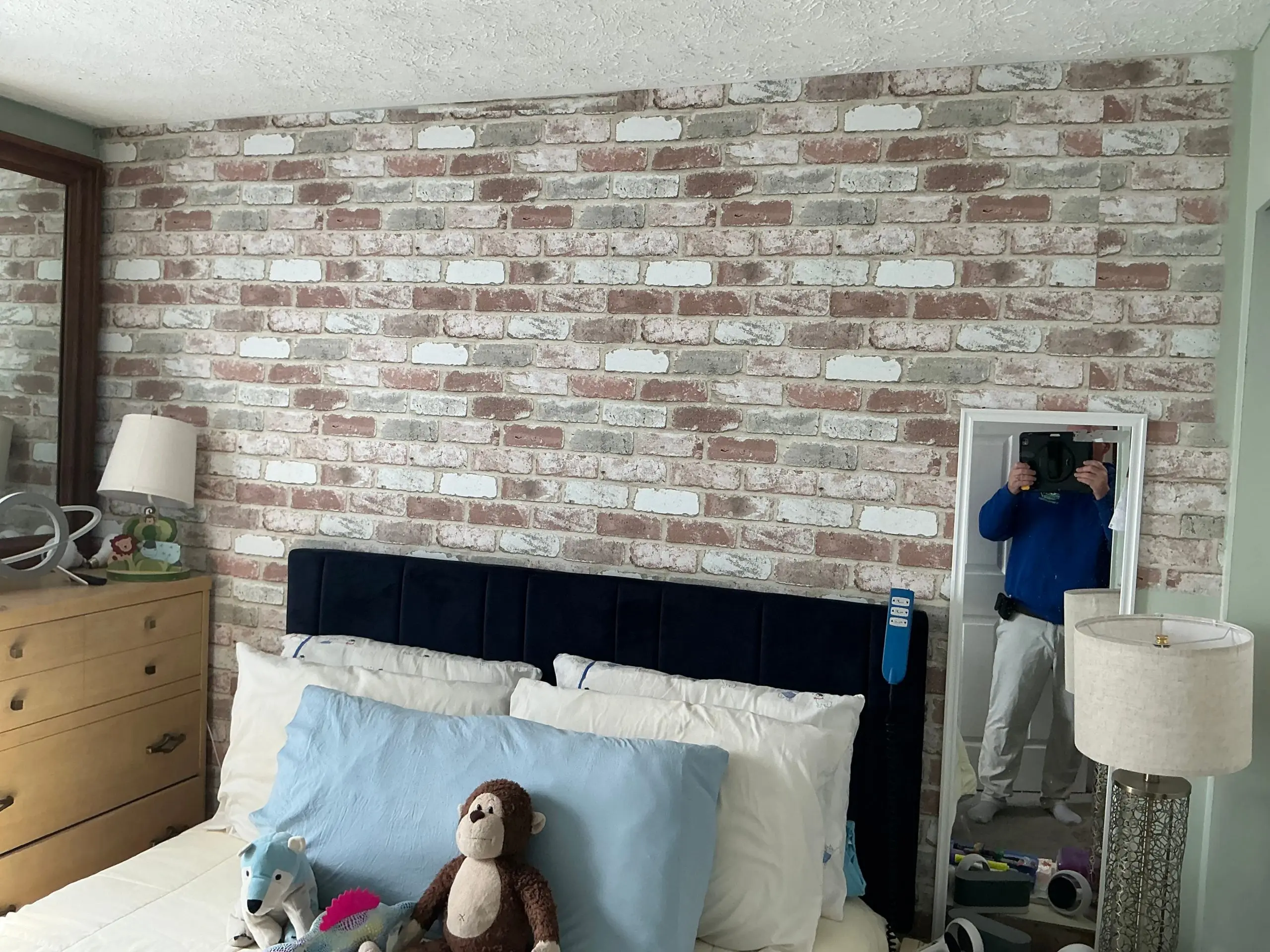 freshly painted brick room with neutral walls in Buffalo home