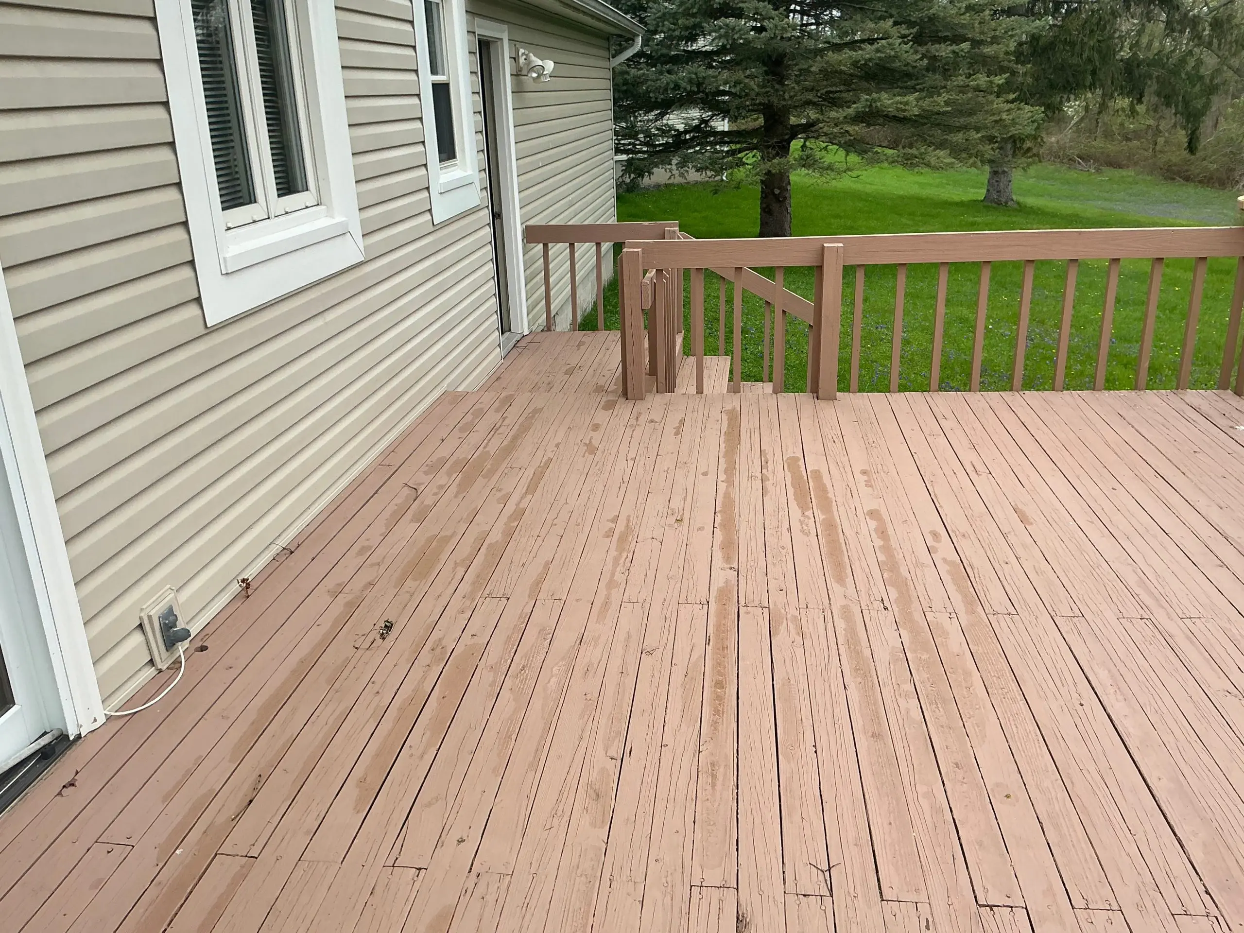 Rochester deck stained warm natural wood color