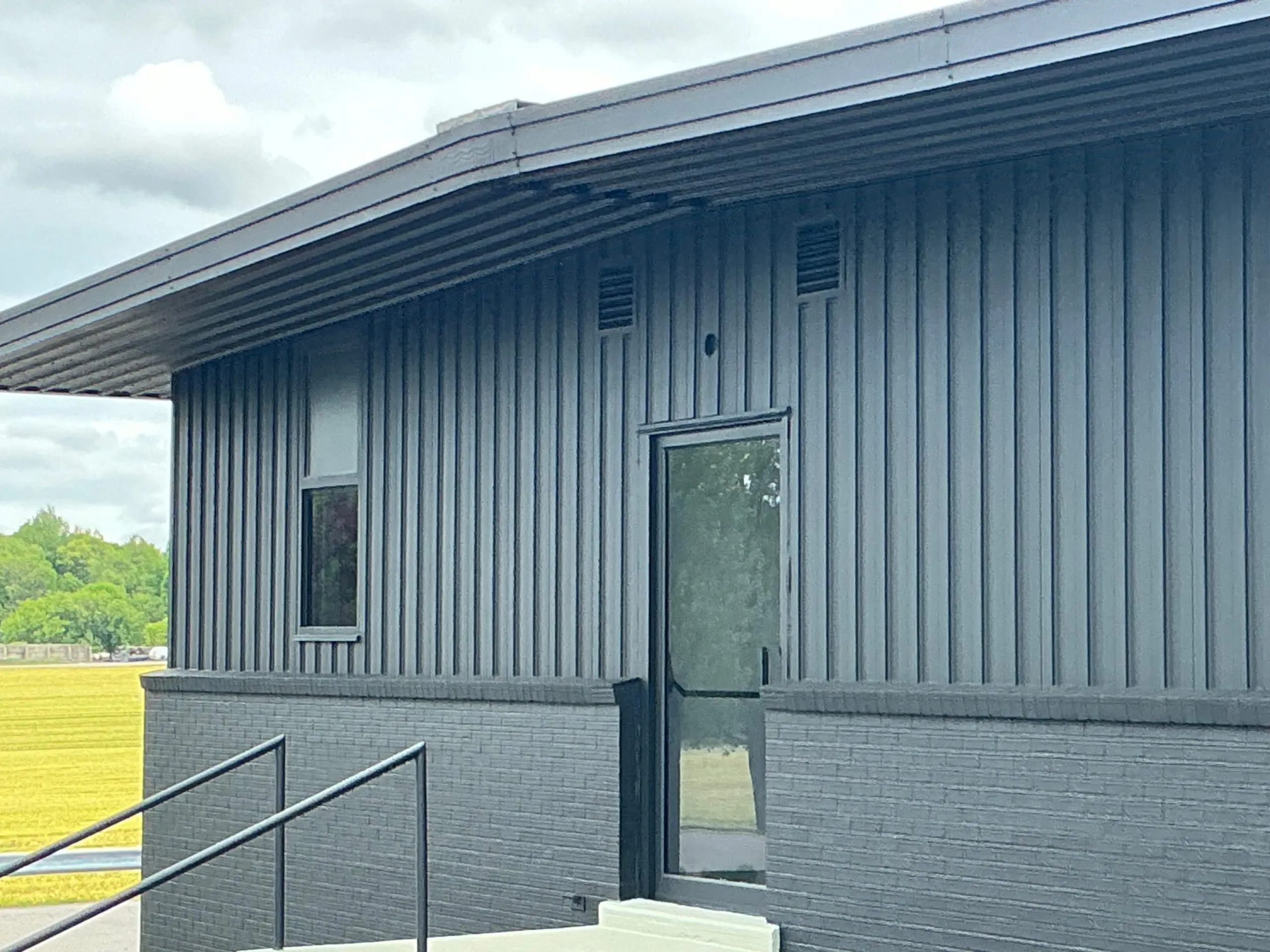 Buffalo commercial space painted black exterior