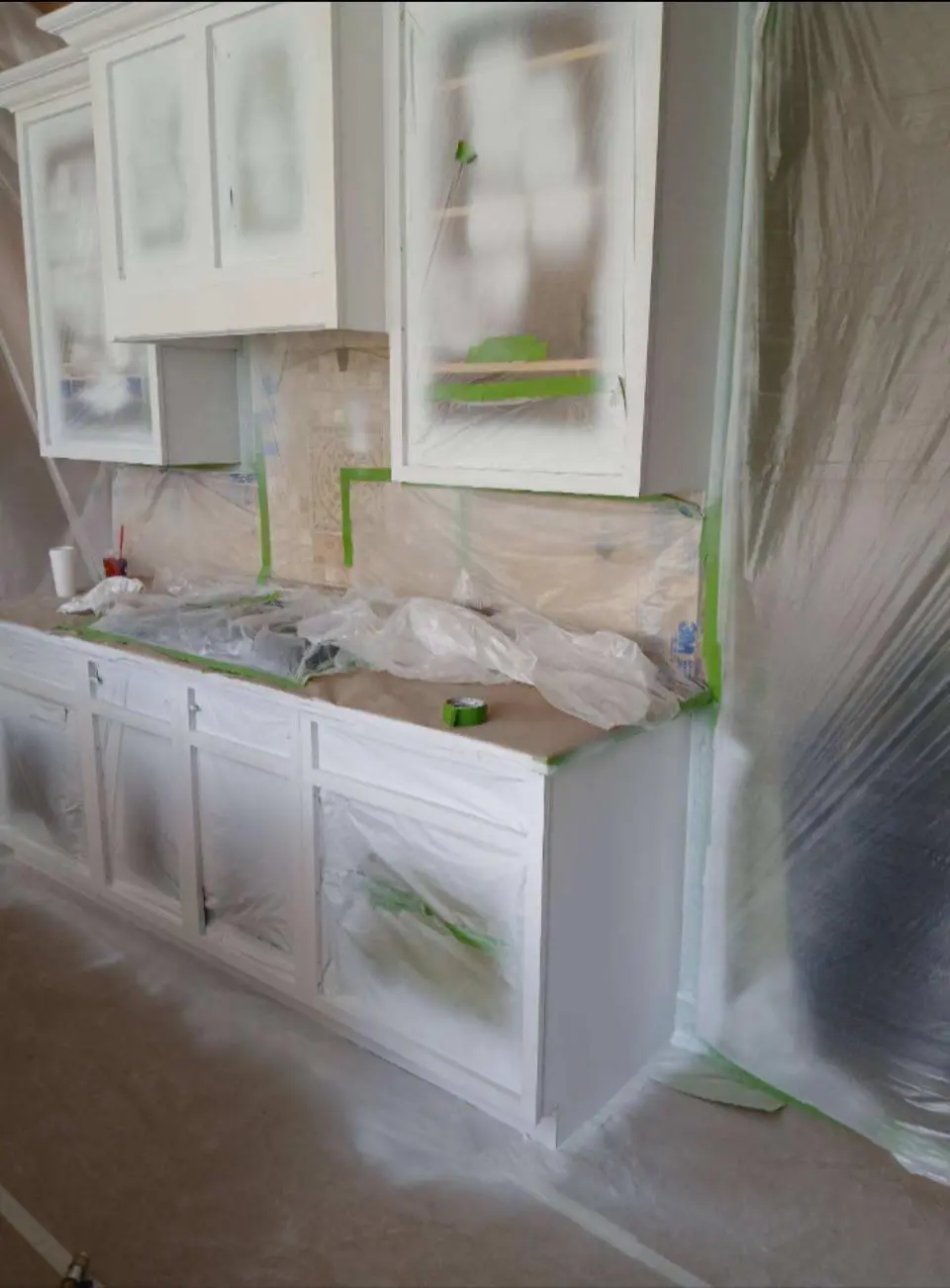 white kitchen cabinets professionally painted in Buffalo home