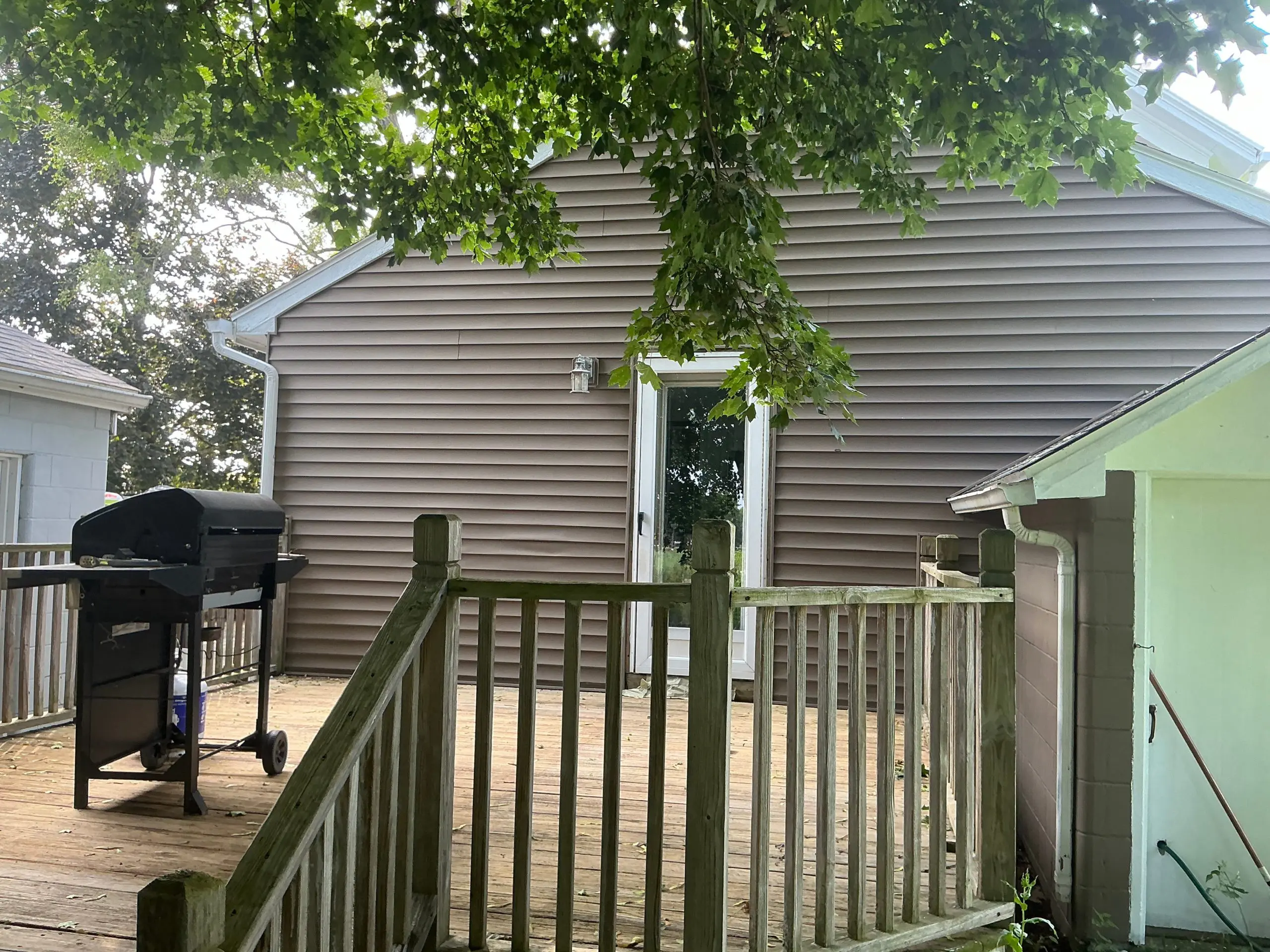 Rochester deck stained warm natural wood color