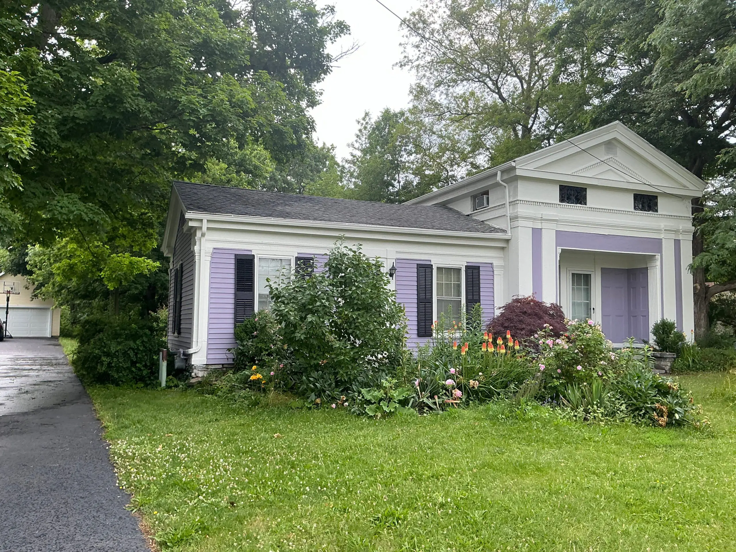 single story Buffalo house painted violet exterior