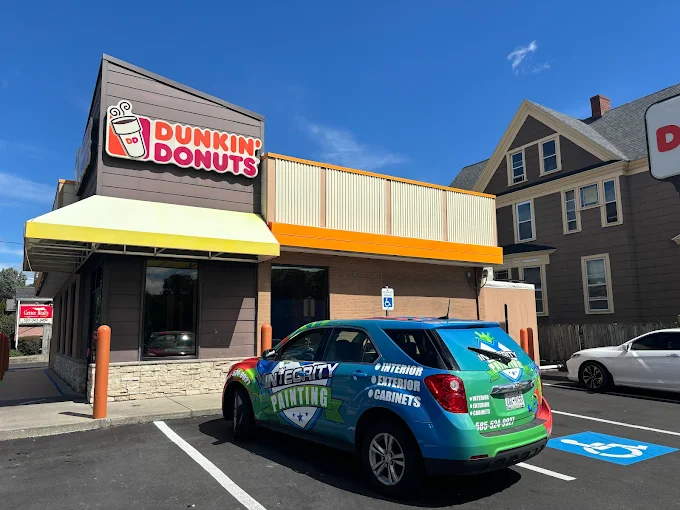 A integrity painting wny car with a beautifull view