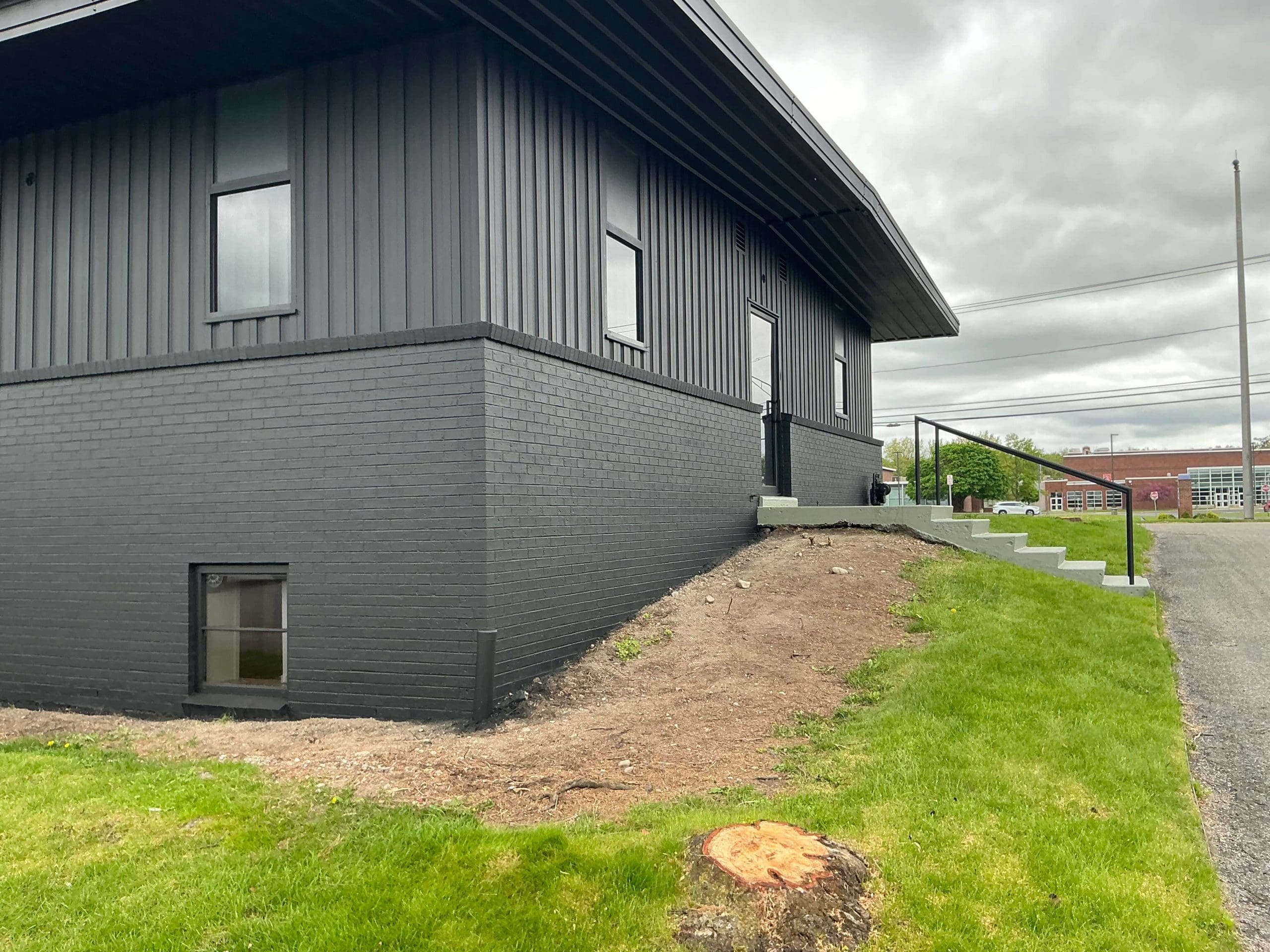 Buffalo commercial space painted black exterior