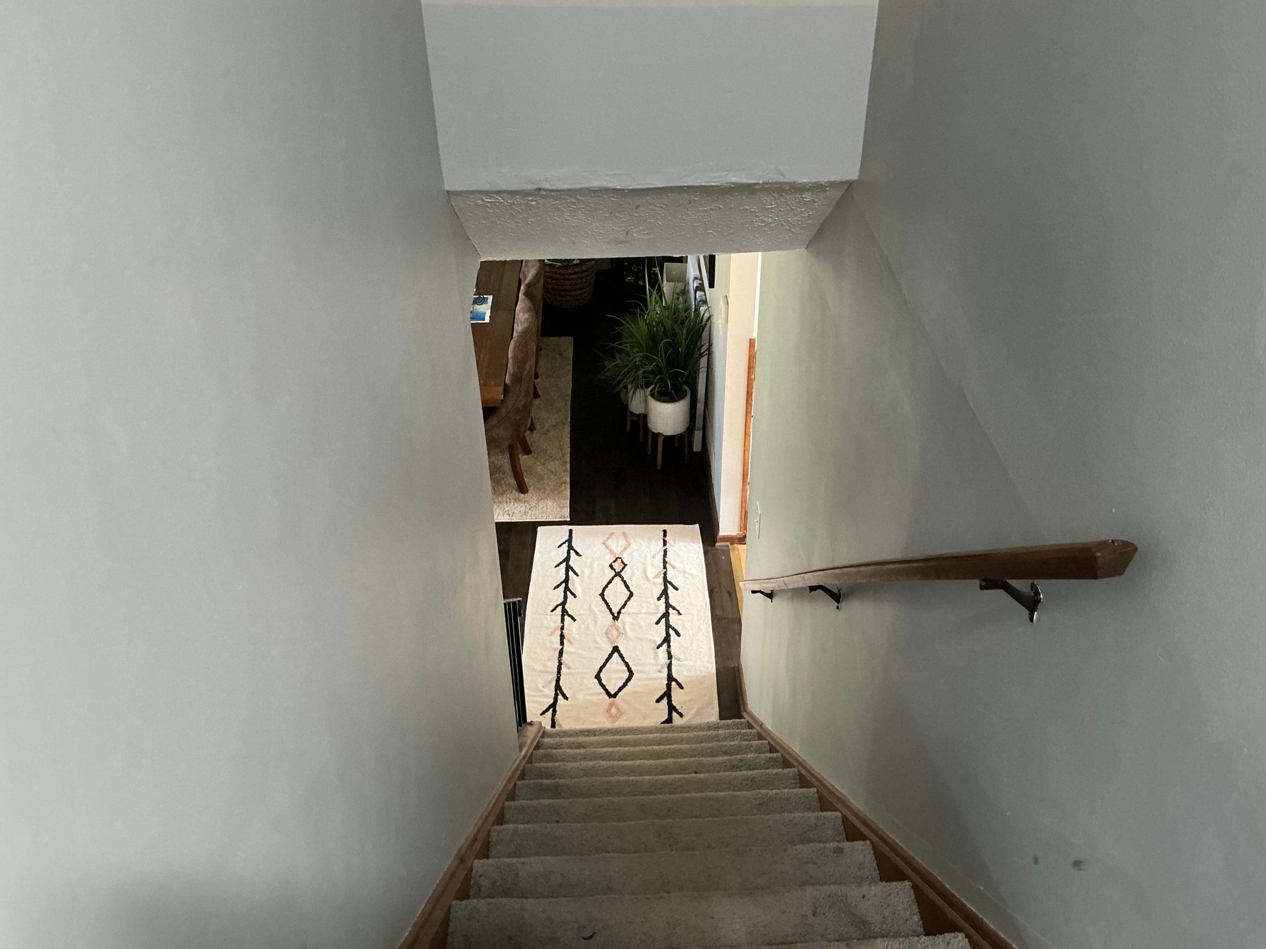 stairwell walls painted light gray in Rochester home