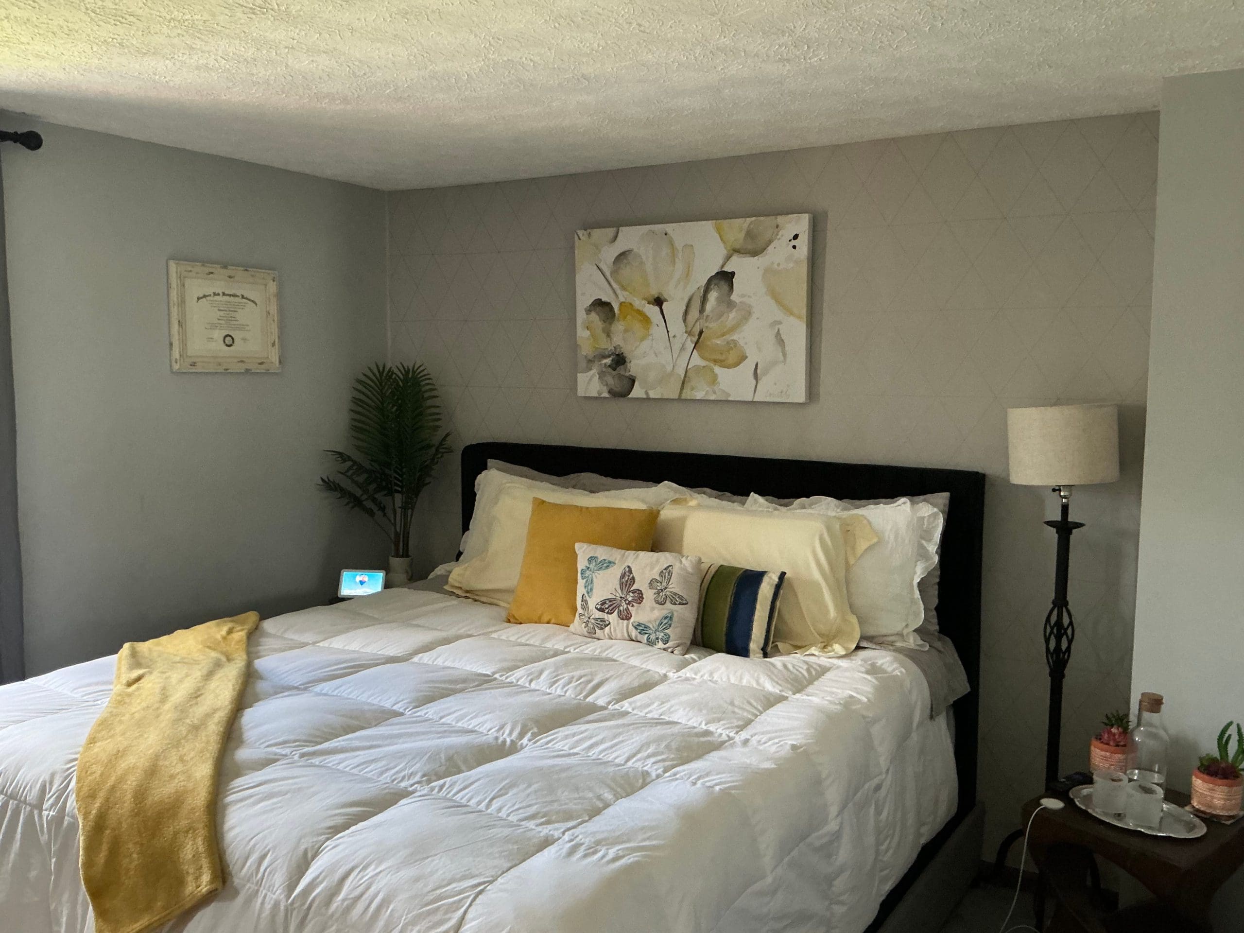 bedroom walls painted light gray in Rochester home
