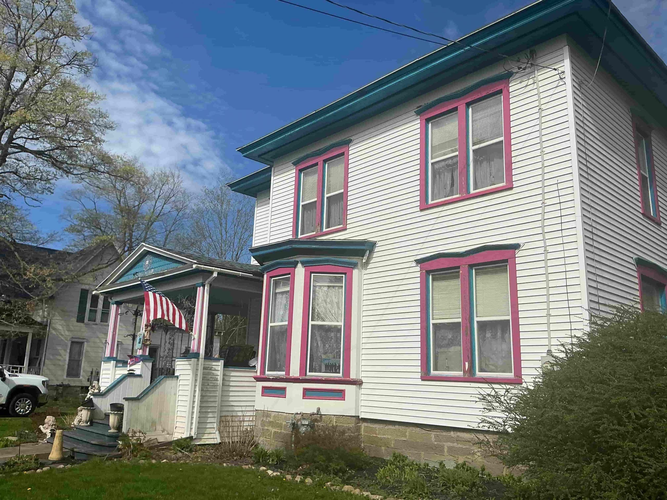 freshly painted siding on Rochester suburban home