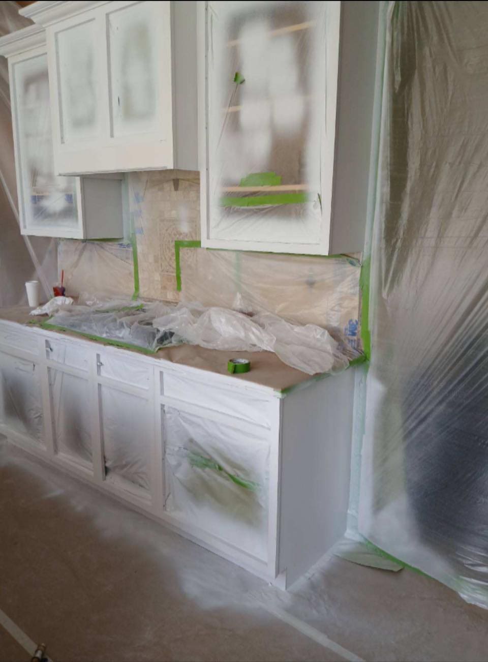 white kitchen cabinets professionally painted in Buffalo home