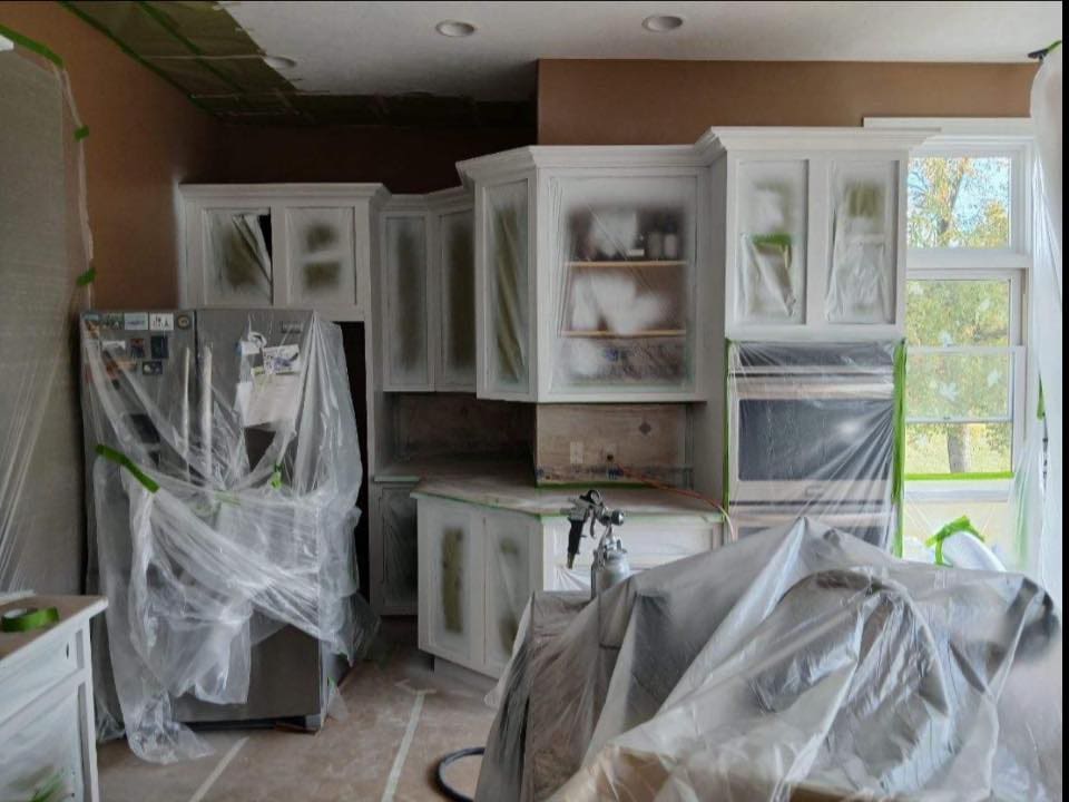 white kitchen cabinets professionally stained in Buffalo home