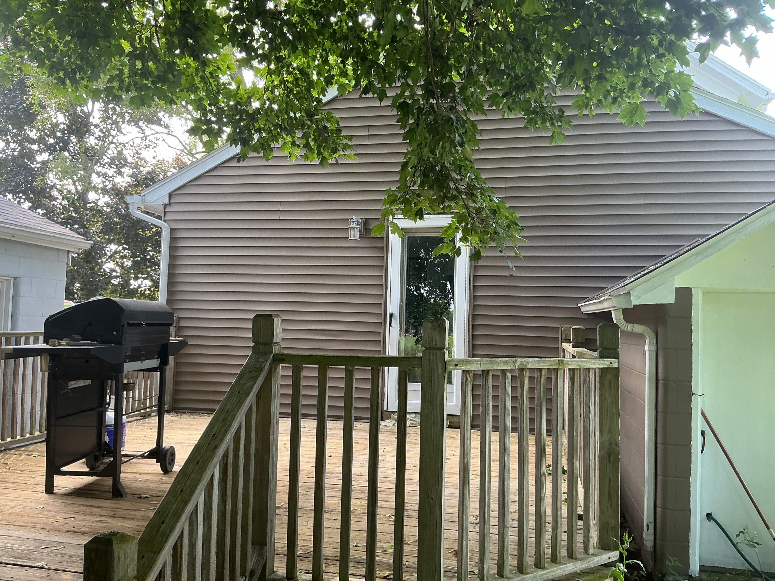 Rochester deck stained warm natural wood color